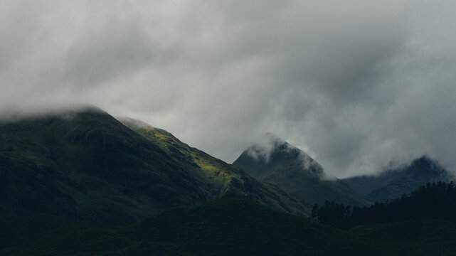 moody mountain landscape with clouds in Scotland