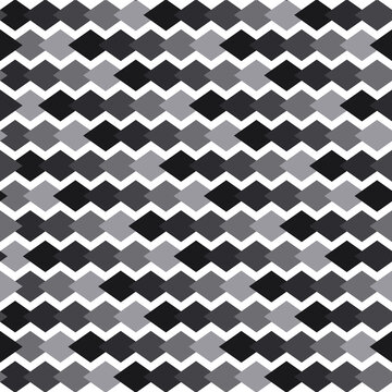 Monochrome geometric seamless pattern with gray and black diamond tiles