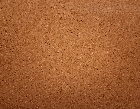 brown vintage corkboard texture background with copy space and smooth grain surface
