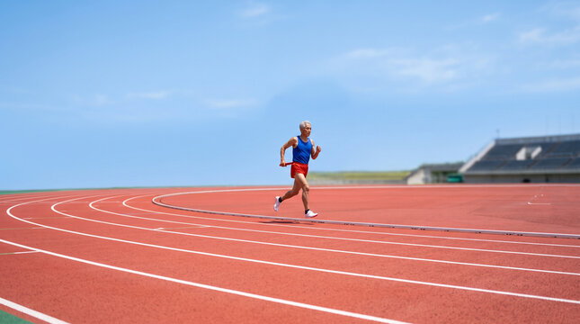 Senior Japanese runner carries the relay baton forward