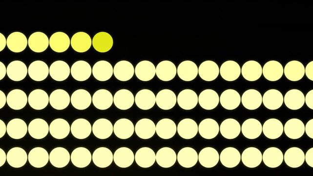 Yellow Light Dots Filling In Row by Row Across a Grid Pattern