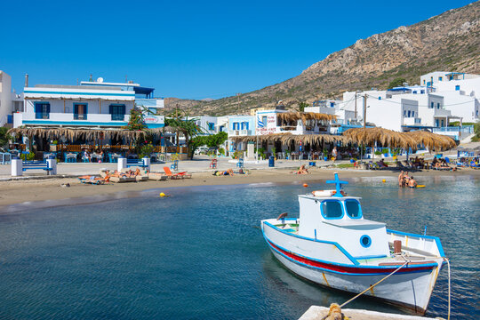 View of sea bay with beautiful beach and traditional church on Karpathos island in Foiniki village, Greece