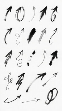 Hand Drawn Arrows in Varied Directions on White Paper