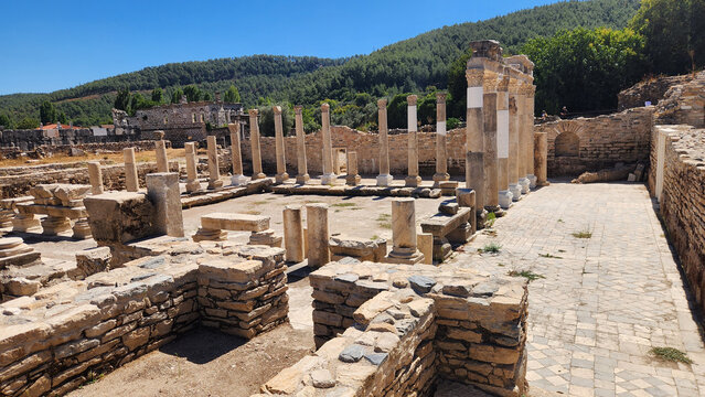 The colonnaded courtyard, or palaestra, of the Roman Bath at Stratonikeia Ancient City in Yatağan, Muğla, reflecting the site's Roman heritage alongside later Ottoman and Republican urban layers.