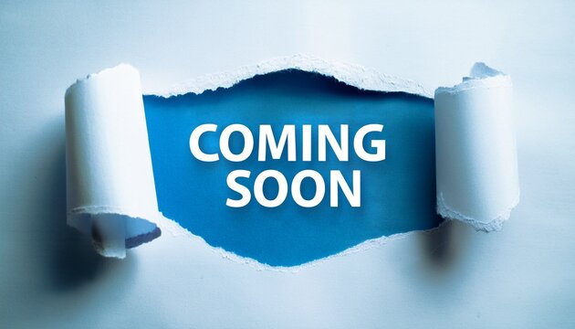 white paper ripped to reveal blue background with coming soon in white