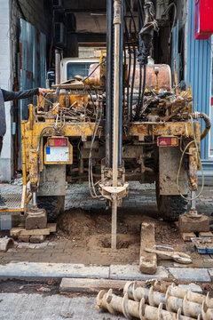 Truck mounted drilling rig used for geotechnical investigation, construction soil testing and borehole work, heavy machinery for engineering assessment