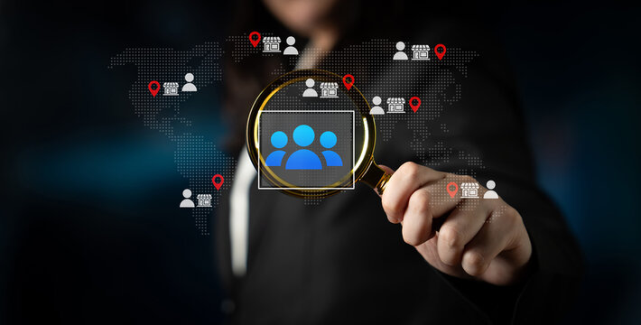 A business professional uses a magnifying glass to analyze digital connections on a global map, highlighting audience engagement and data interactions for strategic insights. Cyphers