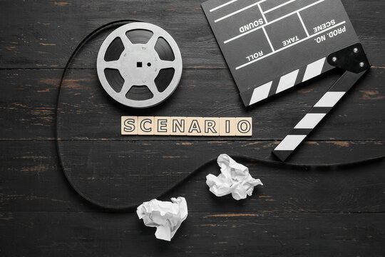 Screenwriting and film production concept, scenario word with movie clapperboard and vintage film reel on dark wooden background for creative industry