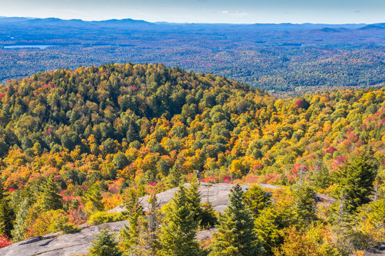 View from St. Regis Fire Tower near Paul Smiths, NY, Adirondacks on a crisp Autumn morning overlooking spectacular fall foliage and wilderness