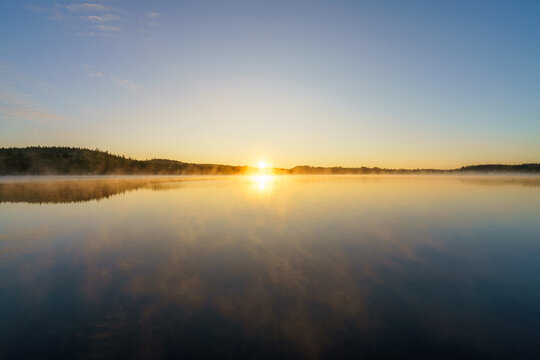 Hallangen lake at sunset. Kalmar region in Sweden. Europe