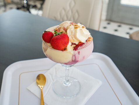 Ice cream in the glass on the table