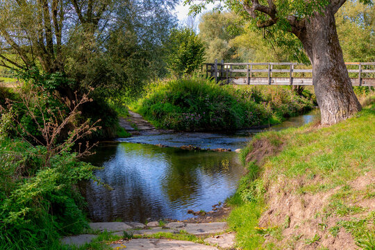 Autumn landscape, Terrain hilly countryside in Zuid-Limburg with wooden bridge and small river kleine Geul and trees, Epen is a village in southern part of the Dutch province of Limburg, Netherlands.