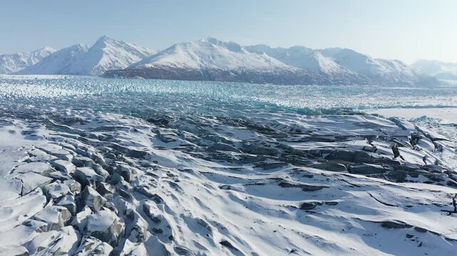 Panoramic View of Glacial Snowfield Approach with Jagged Snow-Covered Peaks