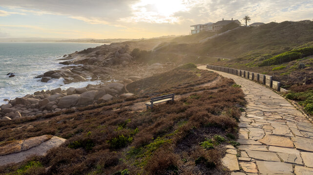 Moody afternoon light with sea spray on the rocks in Port Elliot South Australia looking towards Rocky Bay and Green Bay