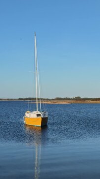 Hayling Island Hampshire England UK. 05.09.2026. Video. Single yacht on moorings on Langestone  Harbour popular holiday destination Hampshire UK