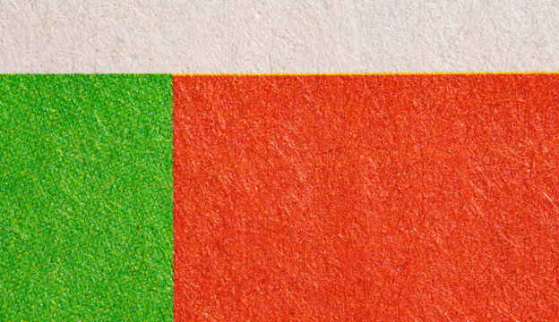 Green and Red Print Blocks Below White Paper