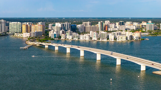 An aerial view of downtown Sarasota, FL and the Ringling Bridge taken during the late afternoon on a hot summer weekend.