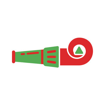 Red and green party horn isolated