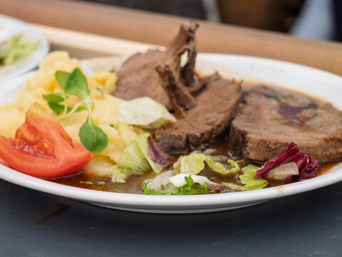 Delicious German Cuisine: Traditional Beef Dish with Vegetables