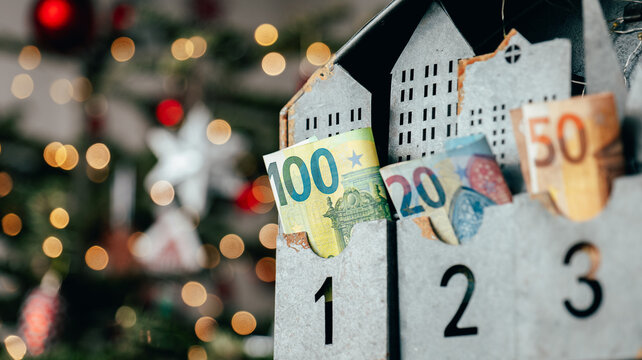  christmas tradition. cash gift.Holiday Savings and Euro Cash Stored in Christmas Calendar.Euro Banknotes Stored in Metal Numbered Storage Drawers.Advent Calendar With Euro Banknotes 
