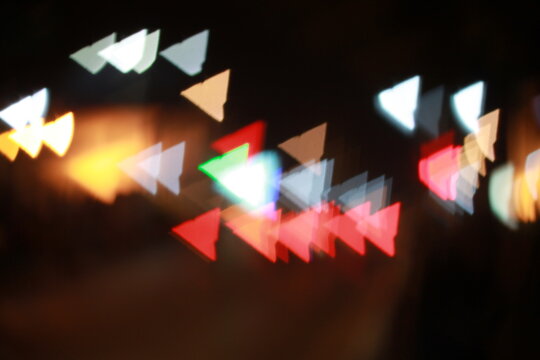 Abstract Night Lights Forming Triangle Bokeh Patterns