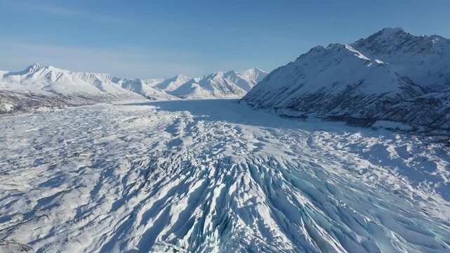 High Altitude Drone Shot Revealing Glacier Crevasses and Polar Landscape