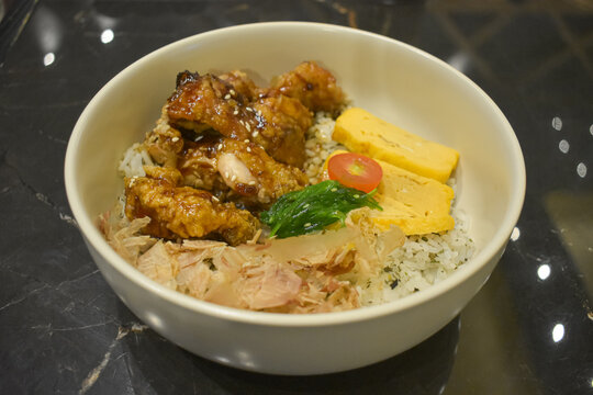 Japanese chicken teriyaki donburi rice bowl with tamagoyaki egg