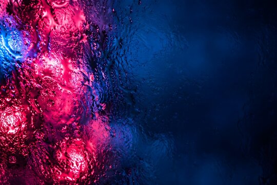 Fondo de textura de vidrio con reflejos de colores.
