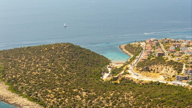 Coastal village and beach near Skala Marion from above