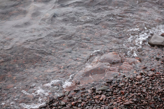Rockhounding the Rocky Lake Superior Shoreline with Copper Pebbles and Wave Action, Keweenaw Peninsula Michigan, No People, Copy Space