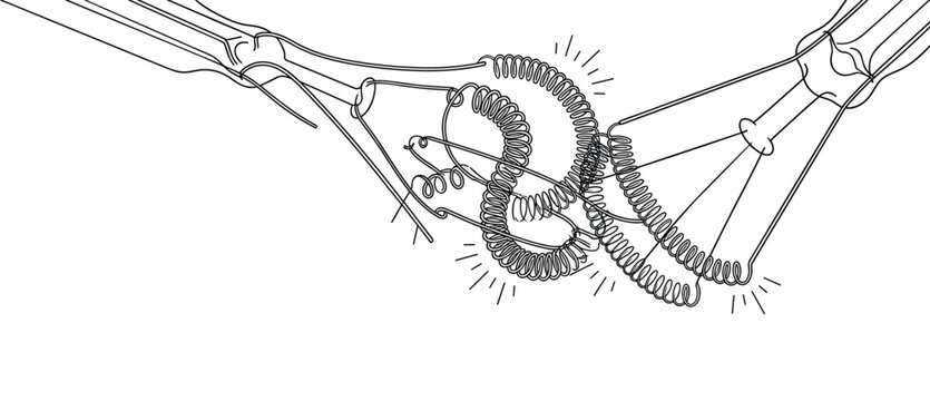 Coiled light bulb filaments touching to create electrical spark.