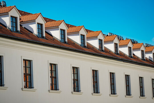 Architecture building rooftop with nobody. Roof window architecture. Architectural rooftop exterior. Rooftop with windows. Roof of the building with windows. Architectural detail exterior