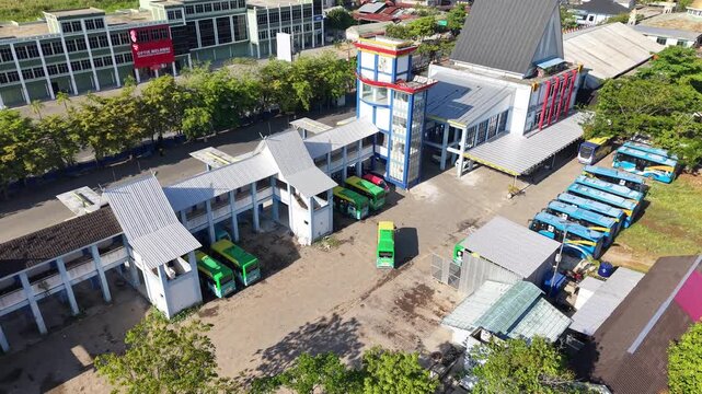 Public transport buses lined up at the transit terminal