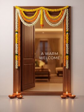Diwali Open wooden door decorated with marigold flower garlands and glowing clay oil lamps on the floor