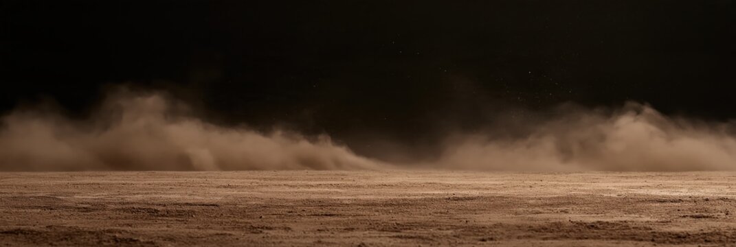Dust storm blowing across dry ground
