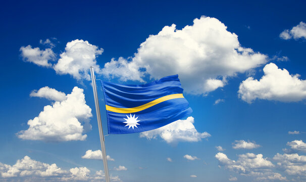 Nauru national flag waving with skyline and buildings. Nauru national flag for independence day.
