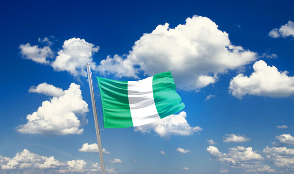 Nigeria national flag waving with skyline and buildings. Nigeria national flag for independence day.
