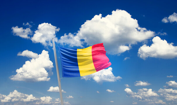Romania national flag waving with skyline and buildings. Romania national flag for independence day.