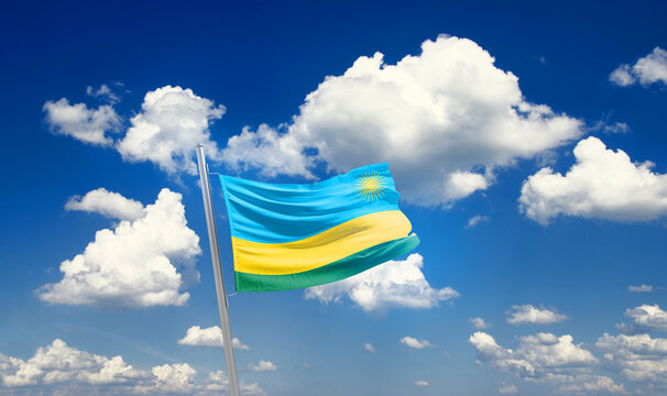 Rwanda national flag waving with skyline and buildings. Rwanda national flag for independence day.