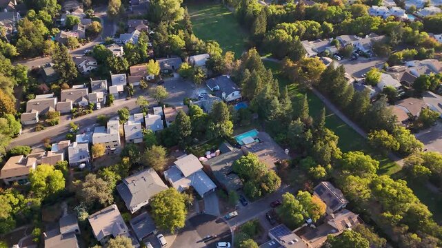 aerial view of a middle class American  residential houses neighborhood in a city suburbs. suburbia