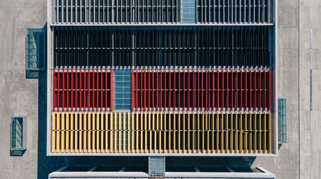 German flag colors, architectural fins flag, modern building facade, Modern Architectural Fins Displaying German Flag Colors on Building Facade Germany Cold Tone, german flag colors, architectural
