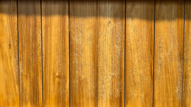Wood texture background, wood planks. Grunge wood, painted wooden wall pattern. side view, front, close up. black, dark, shadows. sunlight, sunshine, sunrise. bright. brown. copy space, empty, free