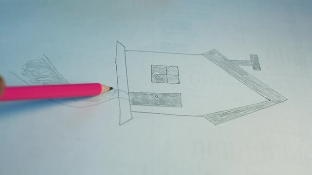 Pink pencil pointing at hand-drawn airplane design, Pink pencil points to a hand-drawn paper airplane sketch on white paper, showing a simple creative design idea and drafting process.