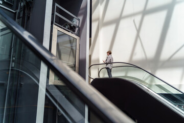 Empty shopping mall escalator and elevator button detail © Павло Сафонов