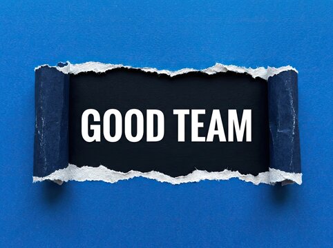 Torn blue paper revealing words good team suitable for corporate and HR marketing symbolizing effective collaboration unity and success