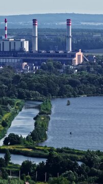 ZE PAK Elektrownia Pątn&oacute;w power plant in Poland with smokestacks and surrounding landscape