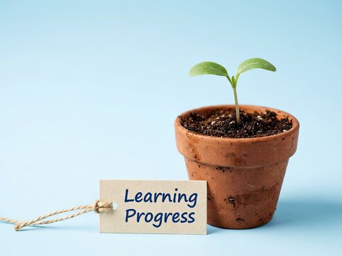 Small seedling in potted soil next to Learning Progress label suitable for educational content symbolizing skill development and personal growth