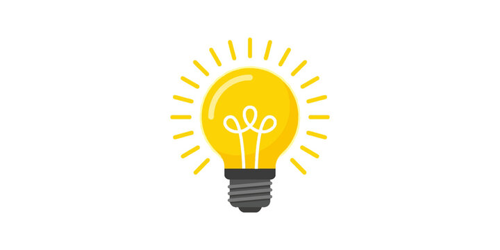Glowing yellow light bulb with radiating bright light beams.