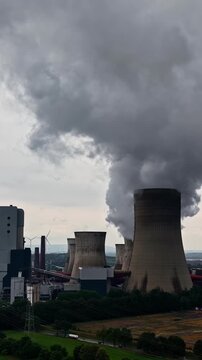 Niederaussem Power Station, Cooling Towers Of A Large Lignite-fired Power Plant In Bergheim, Germany, RWE Power AG. Vertical, Aerial Shot