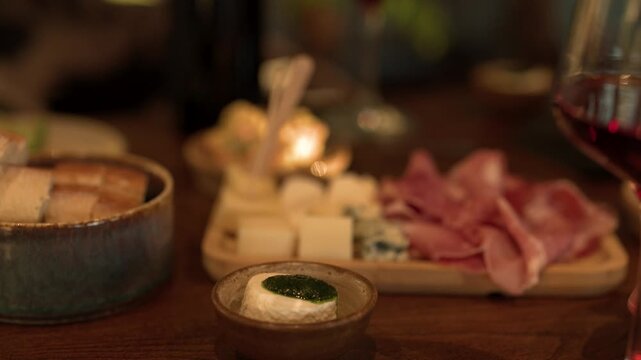 Italian Charcuterie Board with Cured Meats, Cheese, and Red Wine